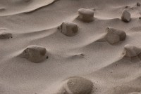 Oceanside, OR, USA beach: sand sculpted by water and wind