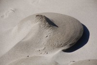 Oceanside, OR, USA beach: sand sculpted by water and wind
