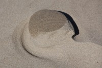 Oceanside, OR, USA beach: sand sculpted by water and wind